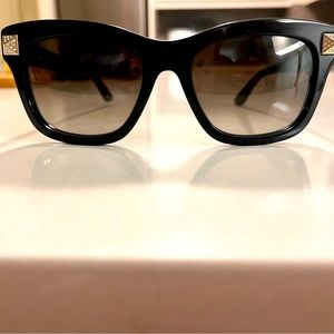 Authentic Valentino classic sunglasses with stud .